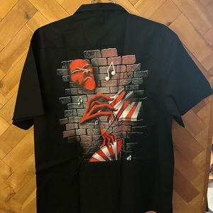 Button down shirts by the artist, ugly hands